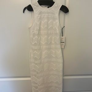 W by Worth White sleeveless dress. Zipper down back. NWT size 0